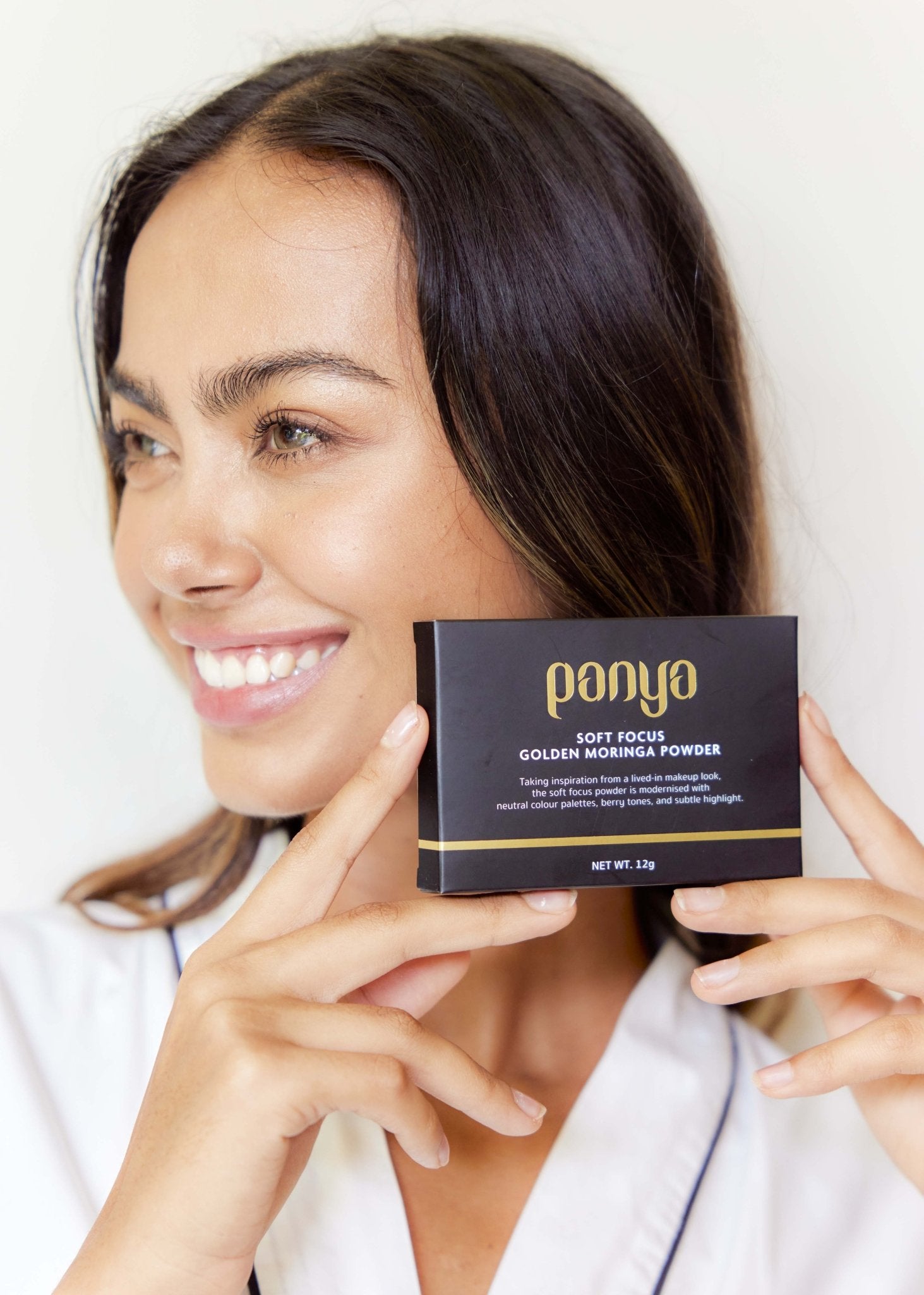 Panya Powder Foundation: Thai moringa oil and 24k gold infused, long lasting and high coverage with pore-blurring technology.