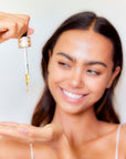 Panya Supreme Golden Moringa Oil: organic, concentrated rejuvenation with 24k gold, Thai moringa & other premium essential oils.