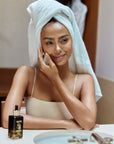 Panya Supreme Golden Moringa Oil: organic, concentrated rejuvenation with 24k gold, Thai moringa & other premium essential oils.