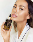 Panya Supreme Golden Moringa Oil: organic, concentrated rejuvenation with 24k gold, Thai moringa & other premium essential oils.