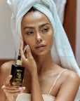 Panya Supreme Golden Moringa Oil: organic, concentrated rejuvenation with 24k gold, Thai moringa & other premium essential oils.