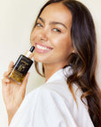 Panya Supreme Golden Moringa Oil: organic, concentrated rejuvenation with 24k gold, Thai moringa & other premium essential oils.