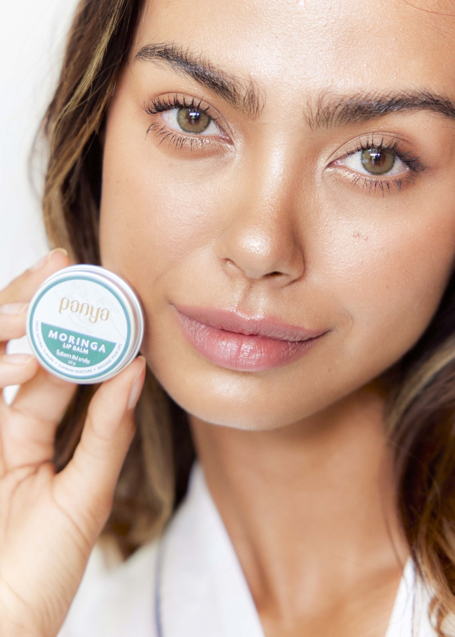 Panya Moringa Lip Balm, with cold-pressed, Thai-grown virgin moringa oil & more, infused with vitamins A, C, and E. 100% organic. 