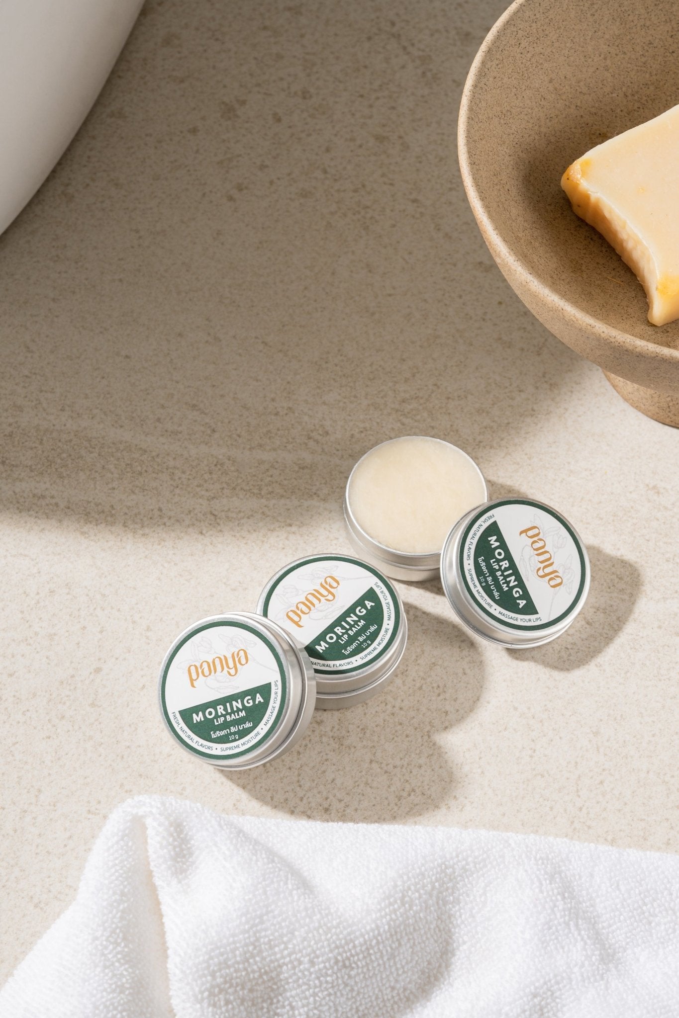 Panya Moringa Lip Balm, with cold-pressed, Thai-grown virgin moringa oil & more, infused with vitamins A, C, and E. 100% organic. 