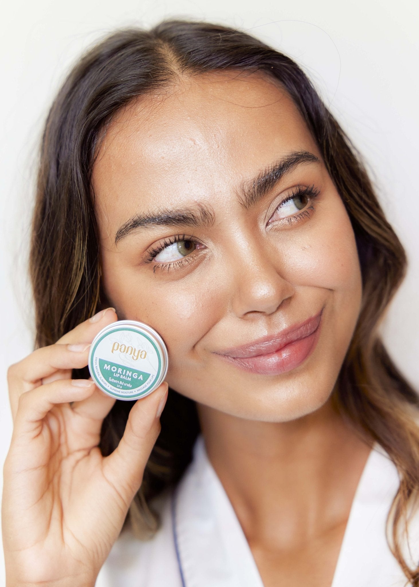 Panya Moringa Lip Balm, with cold-pressed, Thai-grown virgin moringa oil & more, infused with vitamins A, C, and E. 100% organic. 