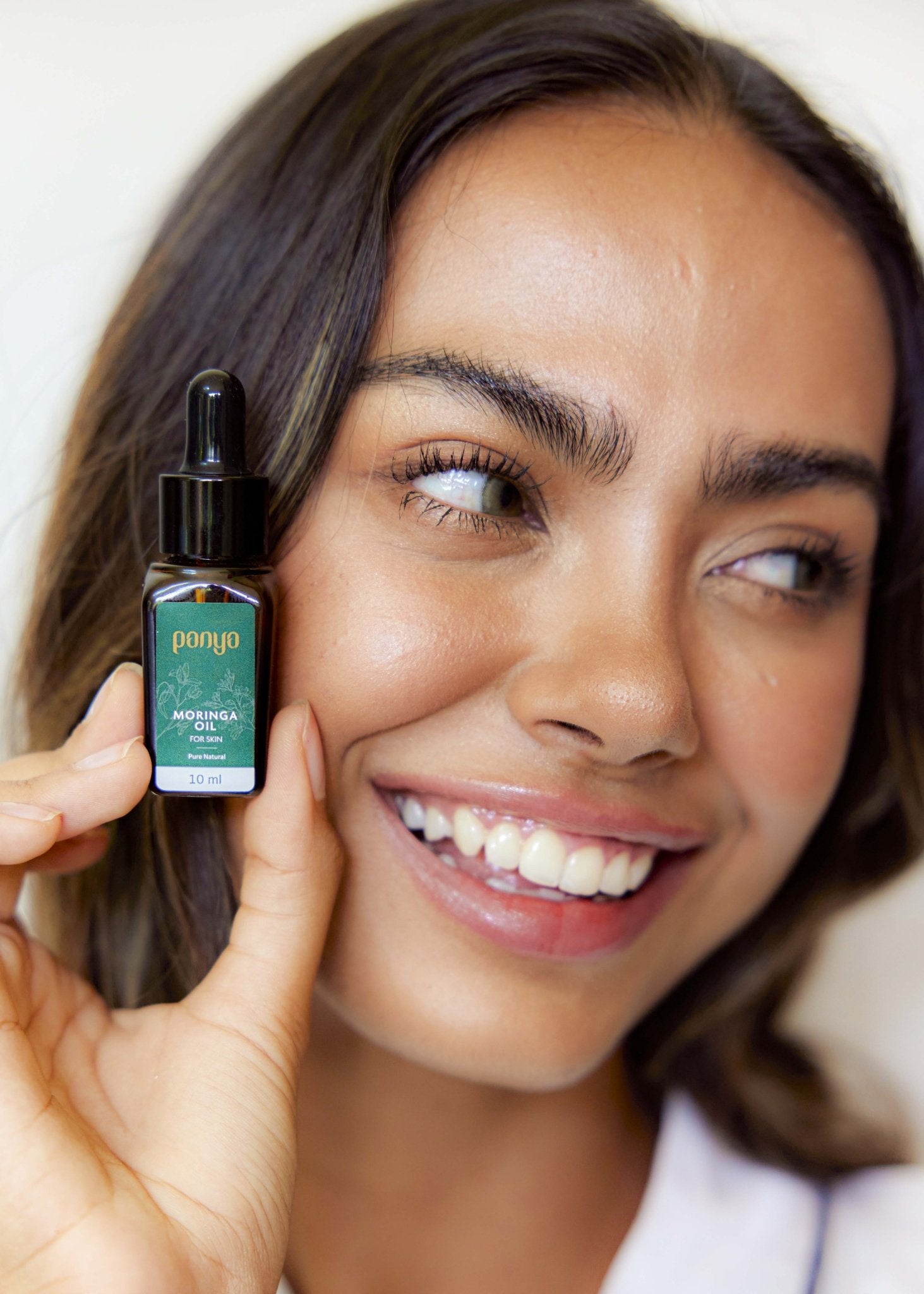 Panya 100% Moringa Oil: vegan Thai-grown cold-pressed virgin moringa oil with 46 antioxidants for strong, smooth skin. 