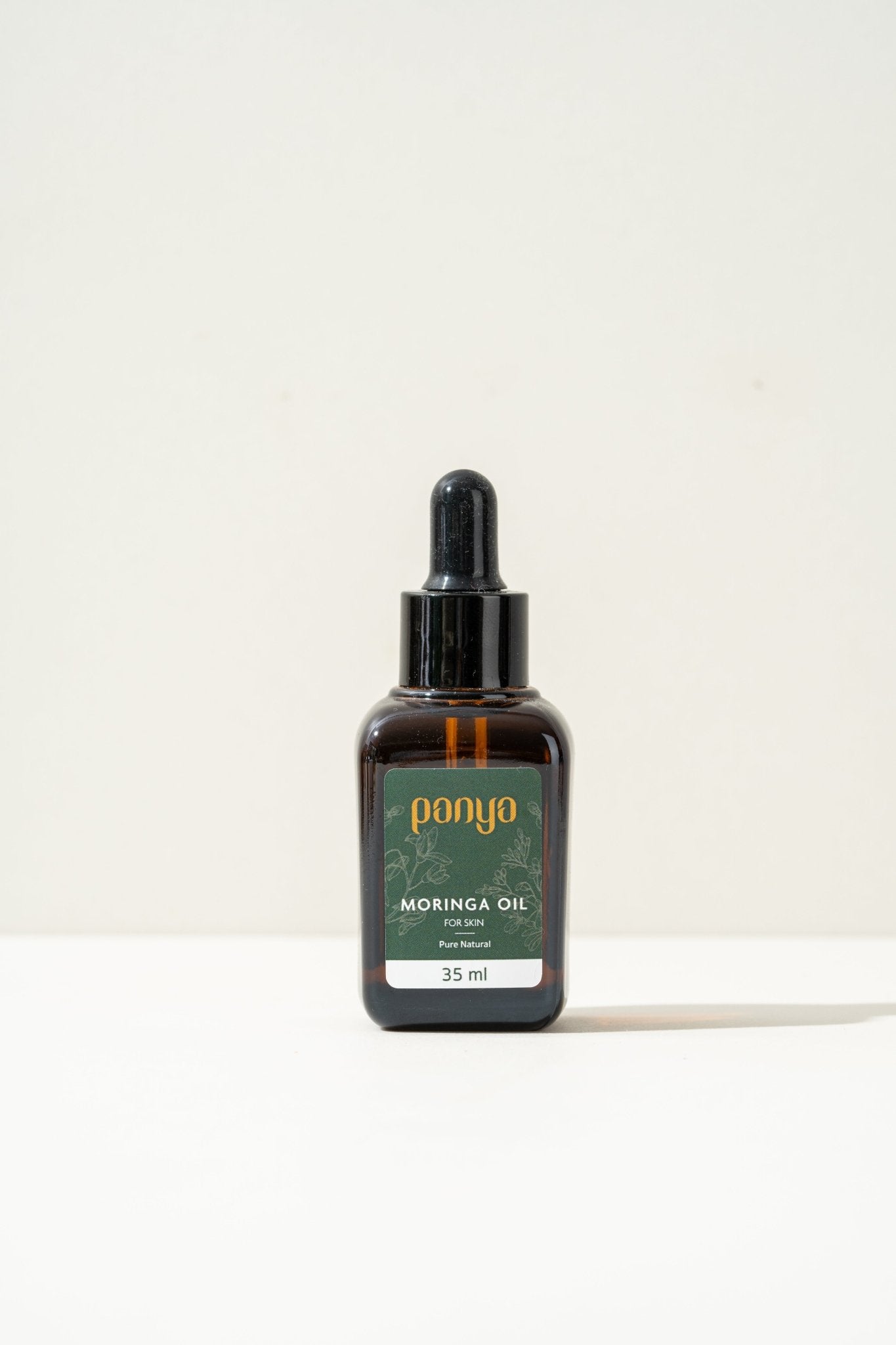 Panya 100% Moringa Oil: vegan Thai-grown cold-pressed virgin moringa oil with 46 antioxidants for strong, smooth skin. 