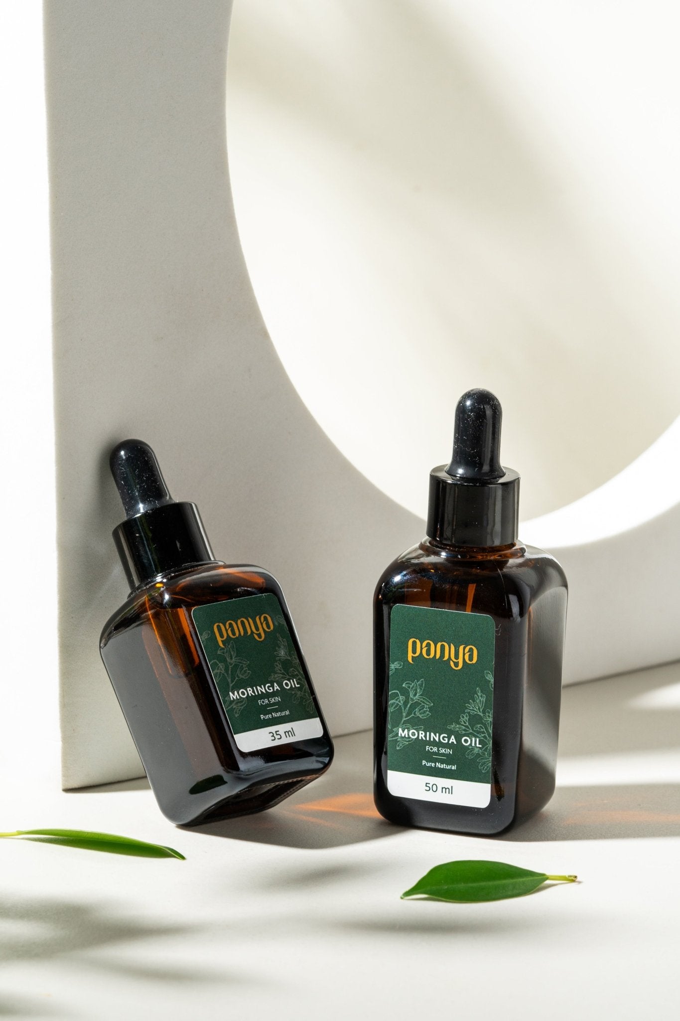 Panya 100% Moringa Oil: vegan Thai-grown cold-pressed virgin moringa oil with 46 antioxidants for strong, smooth skin. 