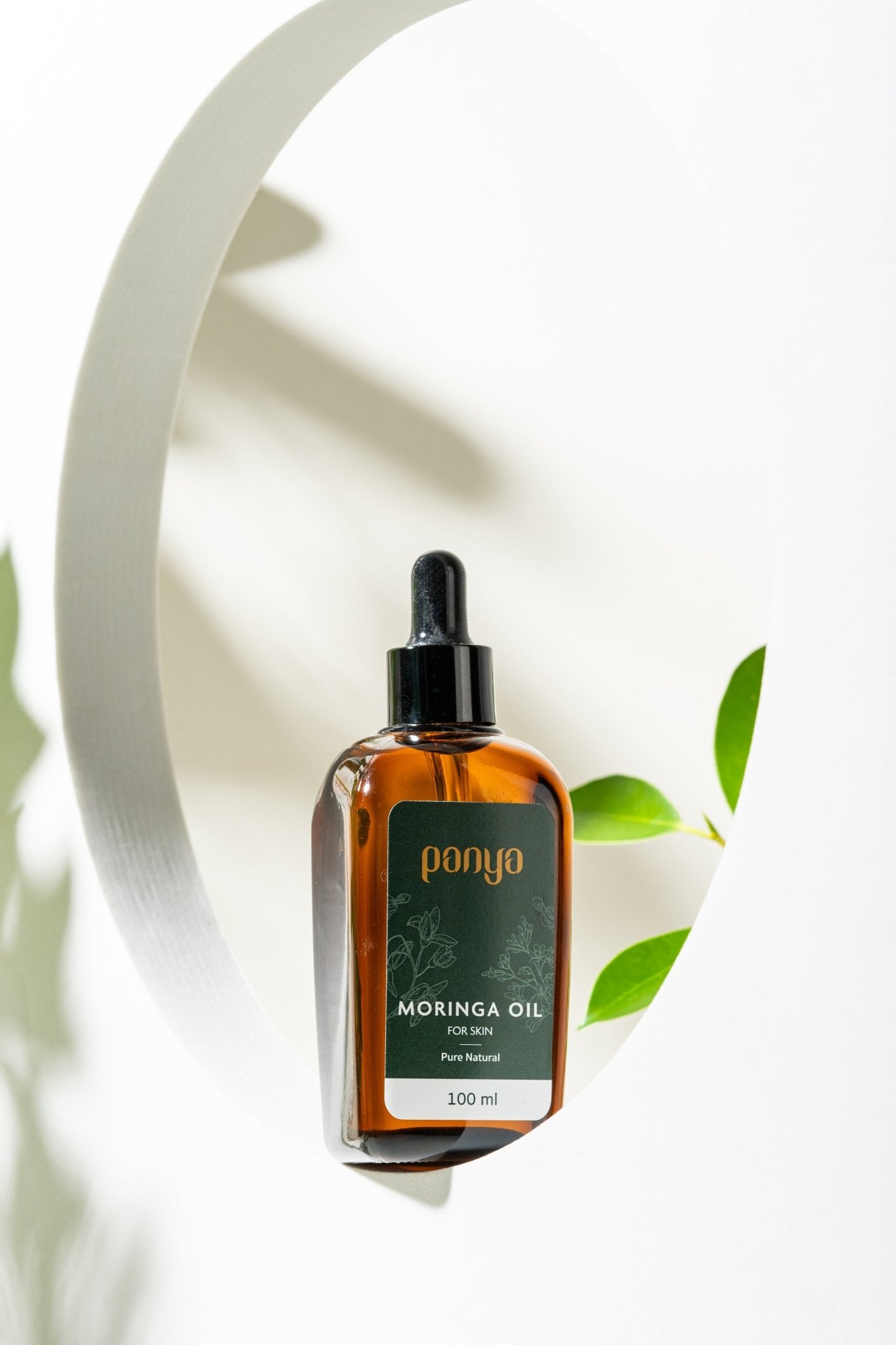 Panya 100% Moringa Oil: vegan Thai-grown cold-pressed virgin moringa oil with 46 antioxidants for strong, smooth skin. 