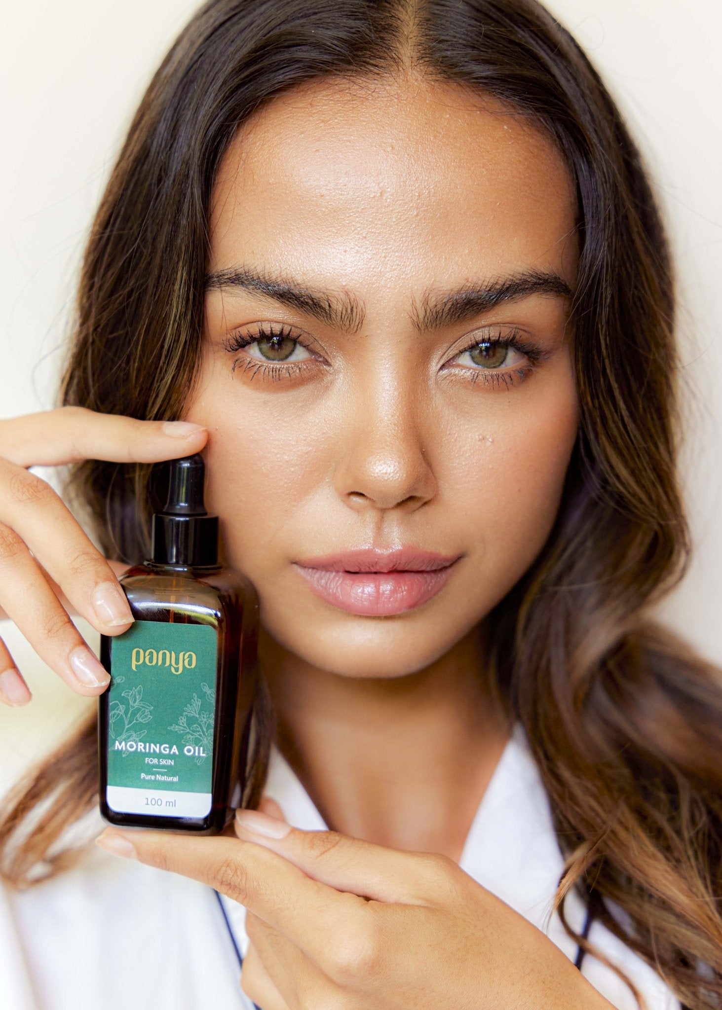 Panya 100% Moringa Oil: vegan Thai-grown cold-pressed virgin moringa oil with 46 antioxidants for strong, smooth skin. 