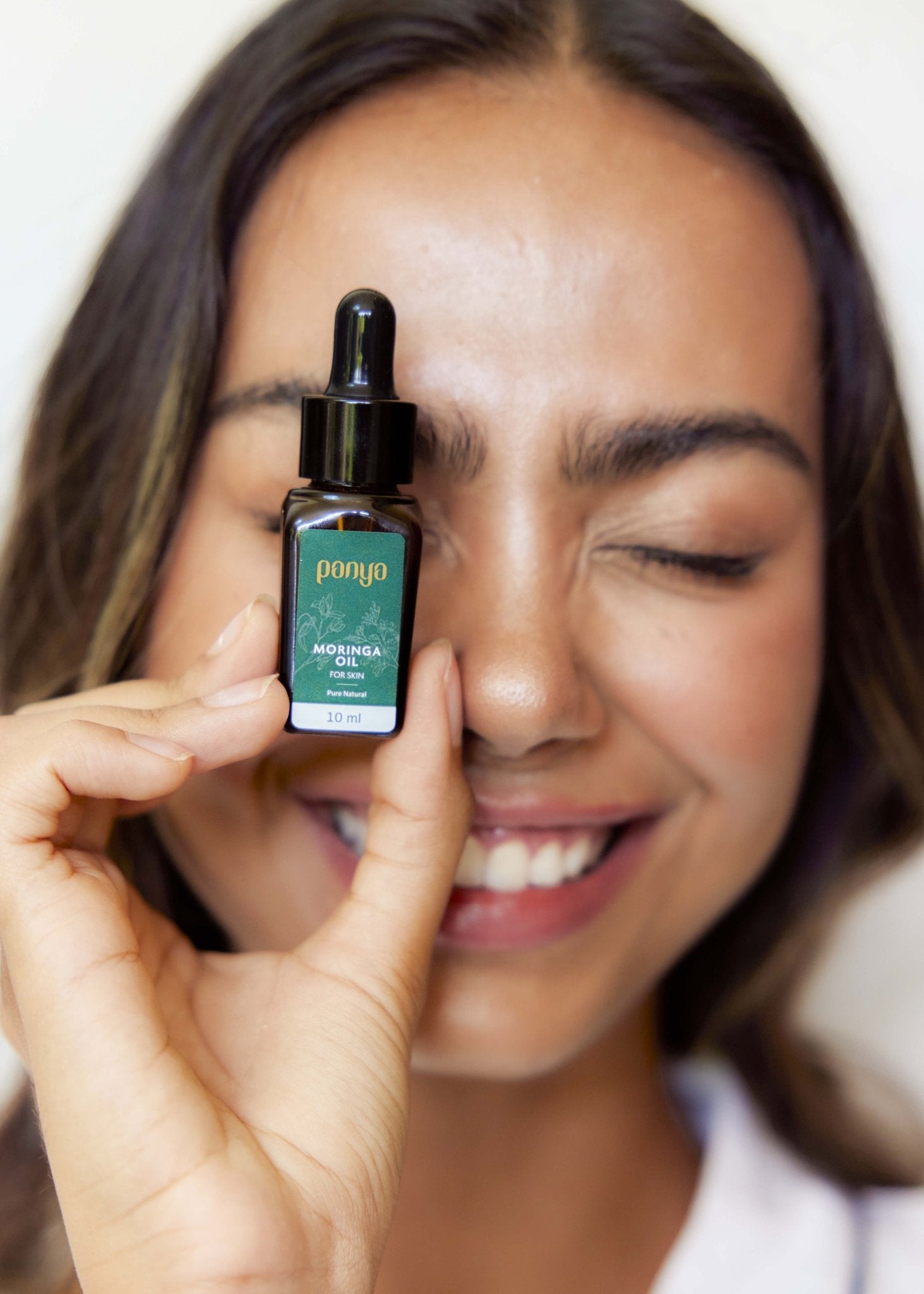 Panya 100% Moringa Oil: vegan Thai-grown cold-pressed virgin moringa oil with 46 antioxidants for strong, smooth skin. 