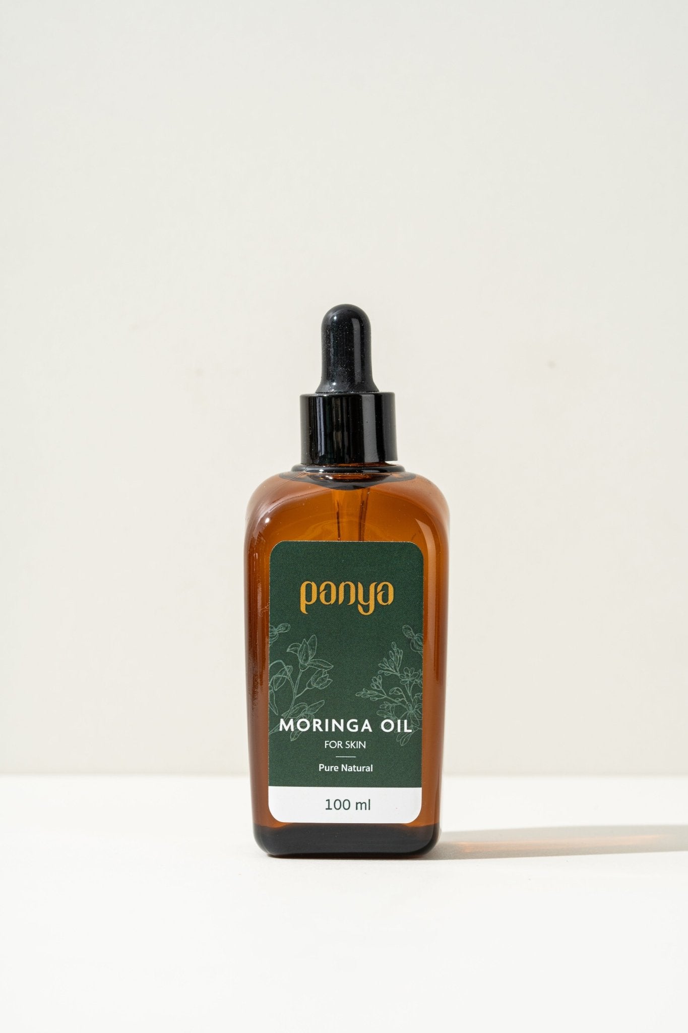 Panya 100% Moringa Oil: vegan Thai-grown cold-pressed virgin moringa oil with 46 antioxidants for strong, smooth skin. 
