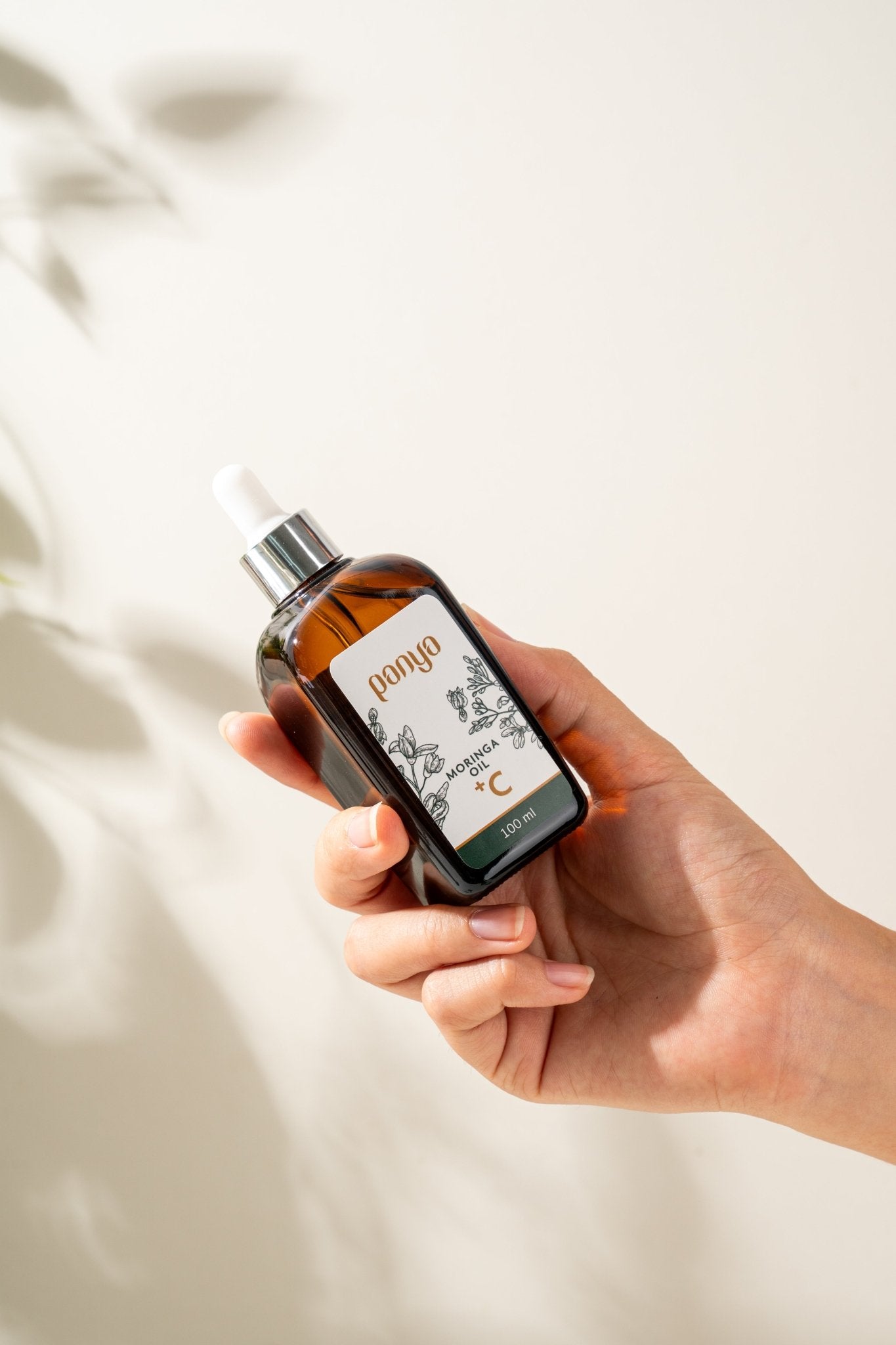 Panya 100% Moringa Oil + Vitamin C: vegan, anti-aging Thai moringa oil with brightening, reparative, antioxidant infusion.