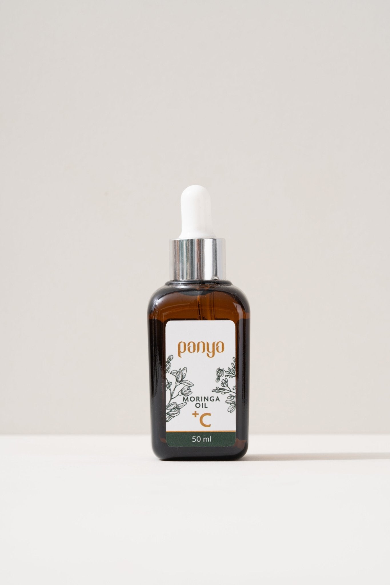 Panya 100% Moringa Oil + Vitamin C: vegan, anti-aging Thai moringa oil with brightening, reparative, antioxidant infusion.
