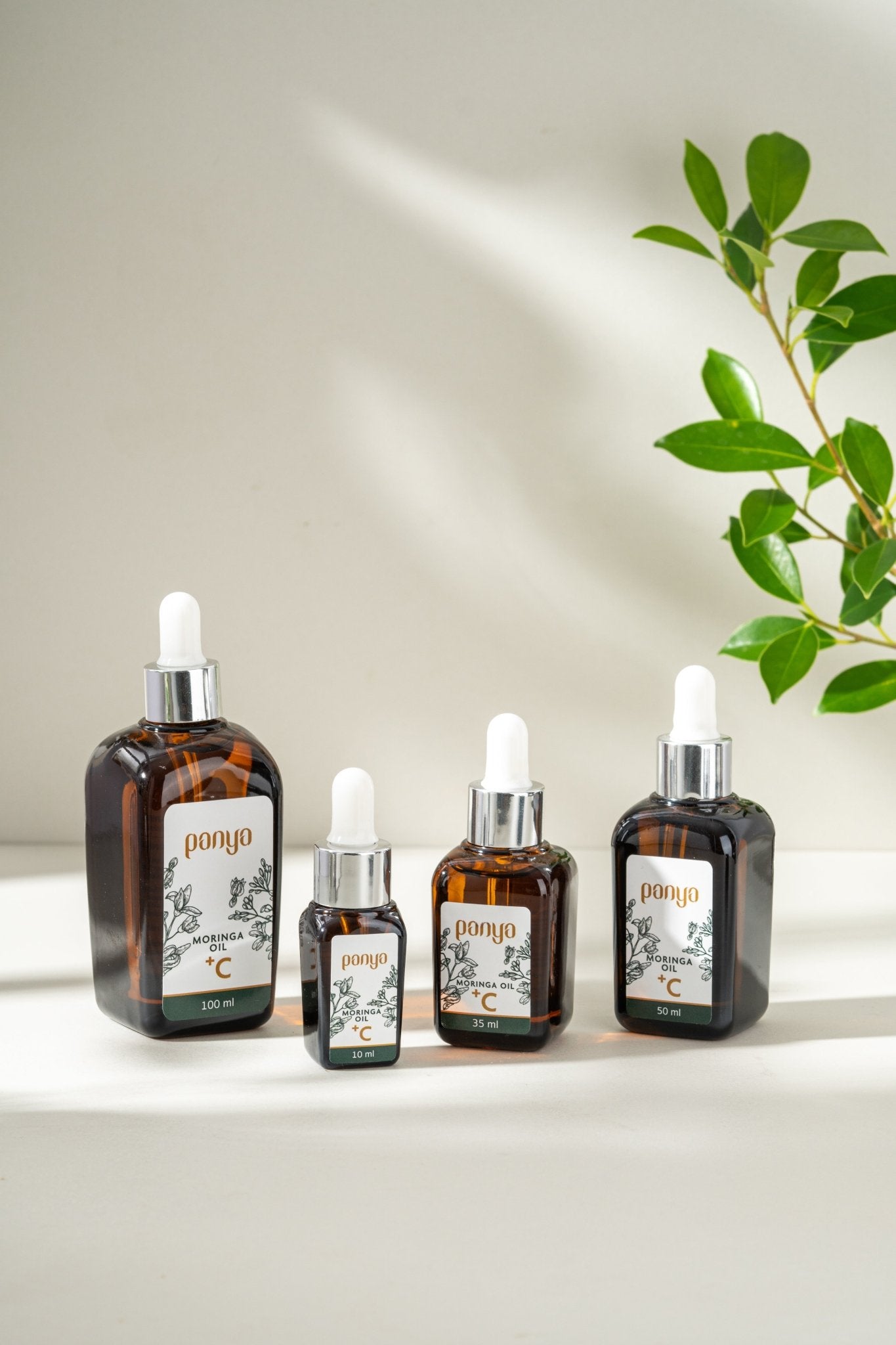 Panya 100% Moringa Oil + Vitamin C: vegan, anti-aging Thai moringa oil with brightening, reparative, antioxidant infusion.
