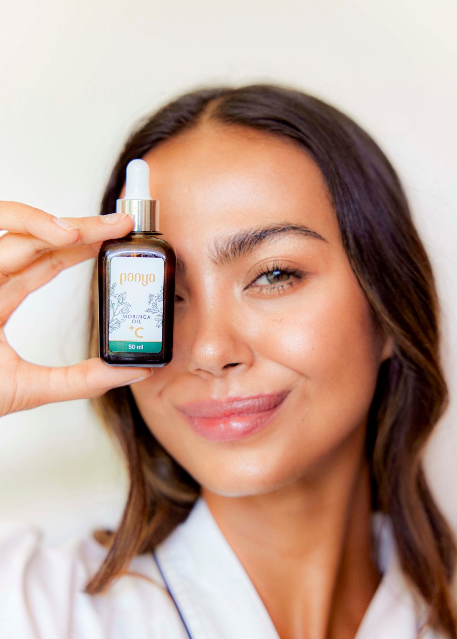 Panya 100% Moringa Oil + Vitamin C: vegan, anti-aging Thai moringa oil with brightening, reparative, antioxidant infusion.