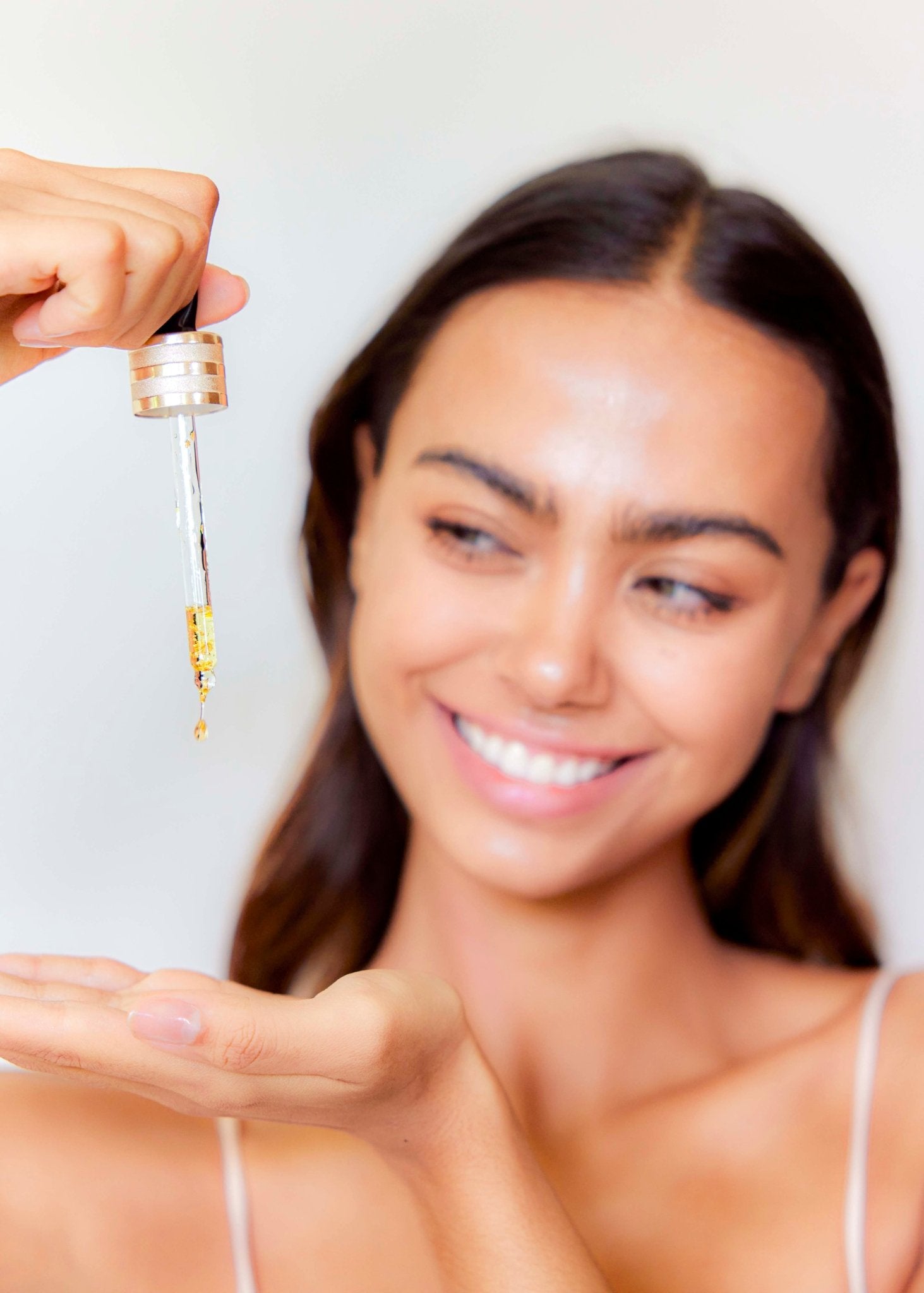 Panya Supreme Golden Moringa Oil: organic, concentrated rejuvenation with 24k gold, Thai moringa & other premium essential oils.