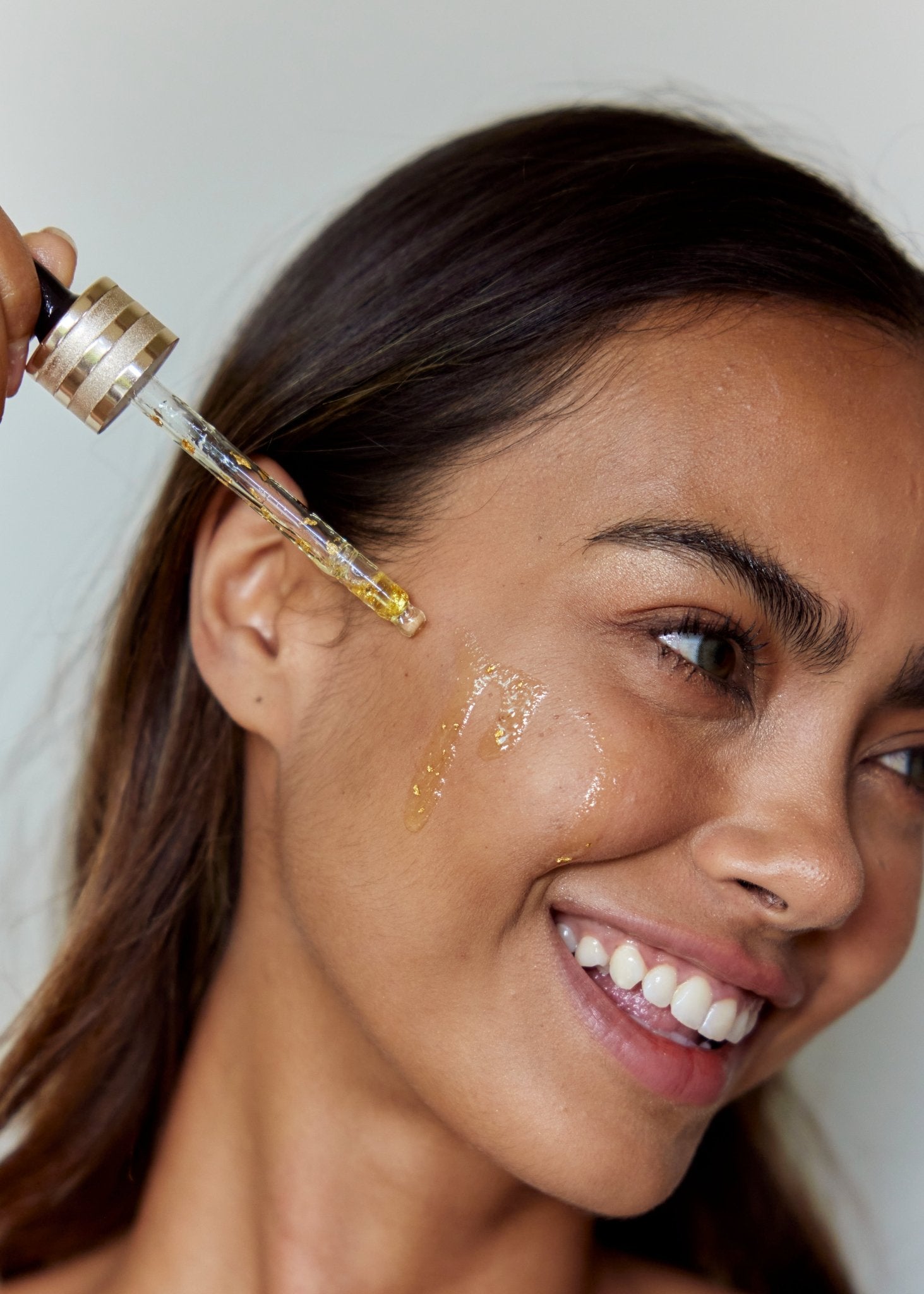 Panya Supreme Golden Moringa Oil: organic, concentrated rejuvenation with 24k gold, Thai moringa &amp; other premium essential oils.